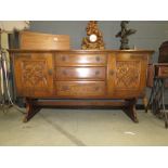 Oak sideboard with carved panels