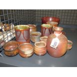 (2145RR) 206 - A group of Japanese studio pottery including a raku fired vase of globular form, h.