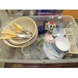 Box containing mixing bowls, fish knives and forks, blue and white crockery and glassware