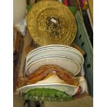 Box containing crockery, coloured glass dishes and brass trays