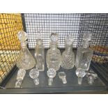 Cage containing 5 decanters & other stoppers