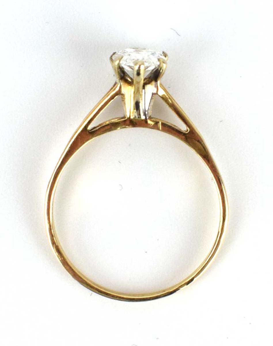 A 14ct yellow gold ring set teardrop diamond in a six claw setting within a split band shank, - Image 6 of 7