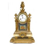 A late 19th century French mantel clock, the movement striking on a bell,