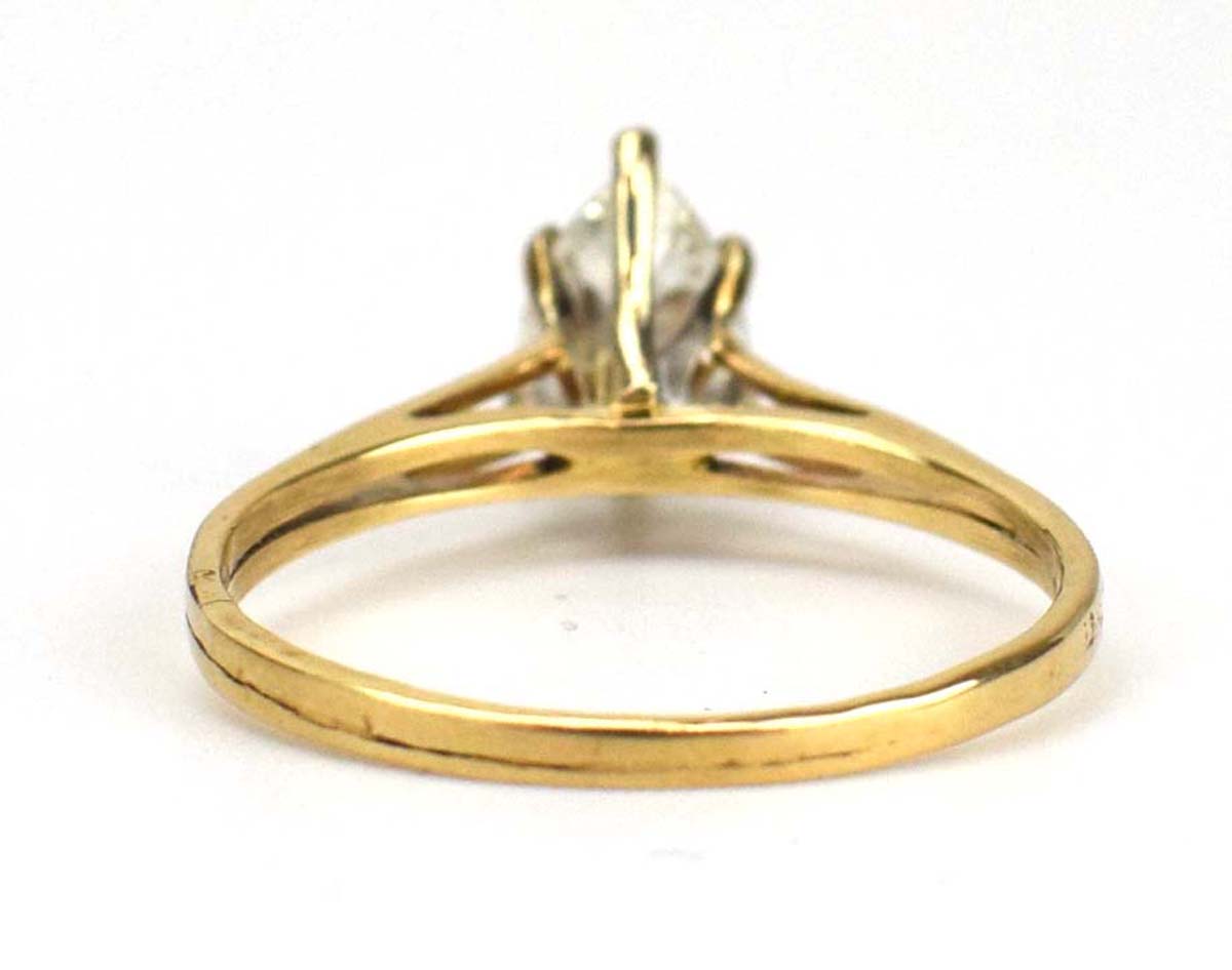 A 14ct yellow gold ring set teardrop diamond in a six claw setting within a split band shank, - Image 5 of 7