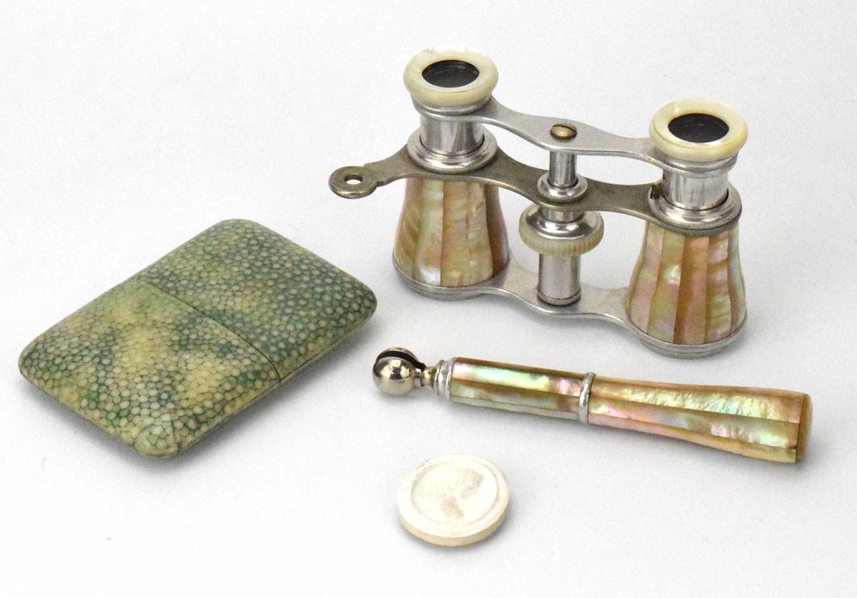 A pair of mother-of-pearl and chromed opera glasses together with a shagreen-type cigarette case