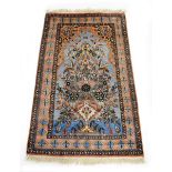 A Kashmir hand-knotted prayer mat depicting the Tree of Life,