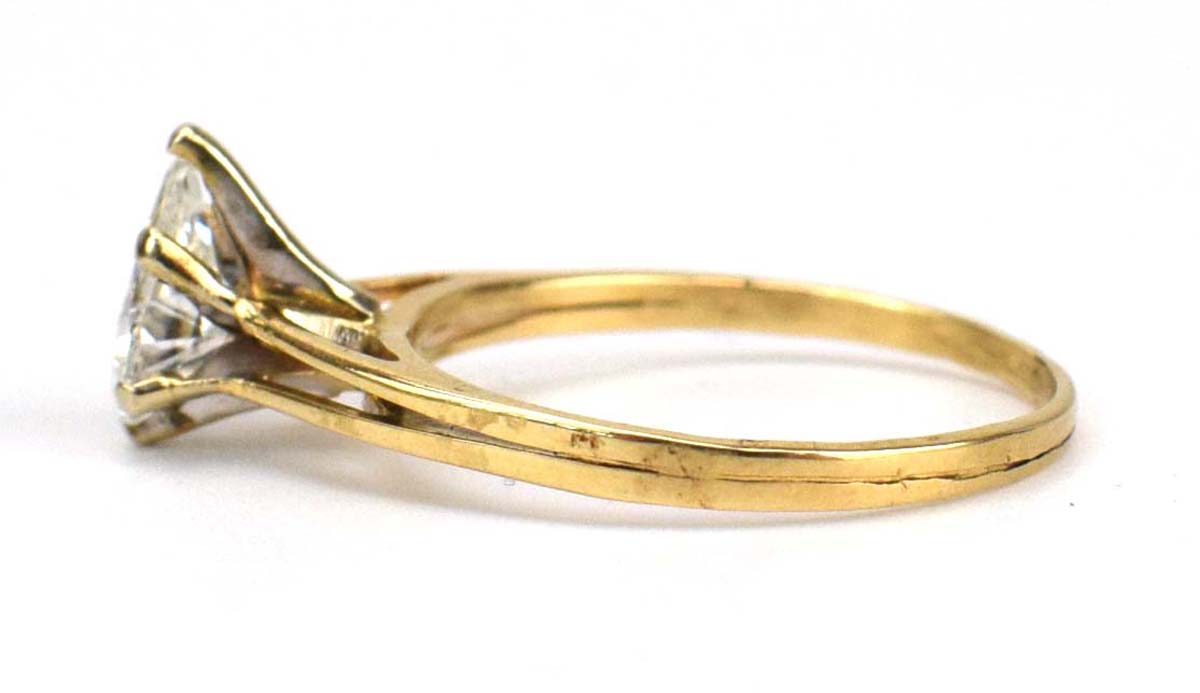 A 14ct yellow gold ring set teardrop diamond in a six claw setting within a split band shank, - Image 4 of 7