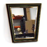 A 1920/30's style mirror of rhombus form with a green velour and gilt frame,