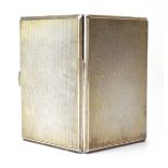 A mid-20th century silver, parcel gilt and engine turned cigarette case of rectangular form,