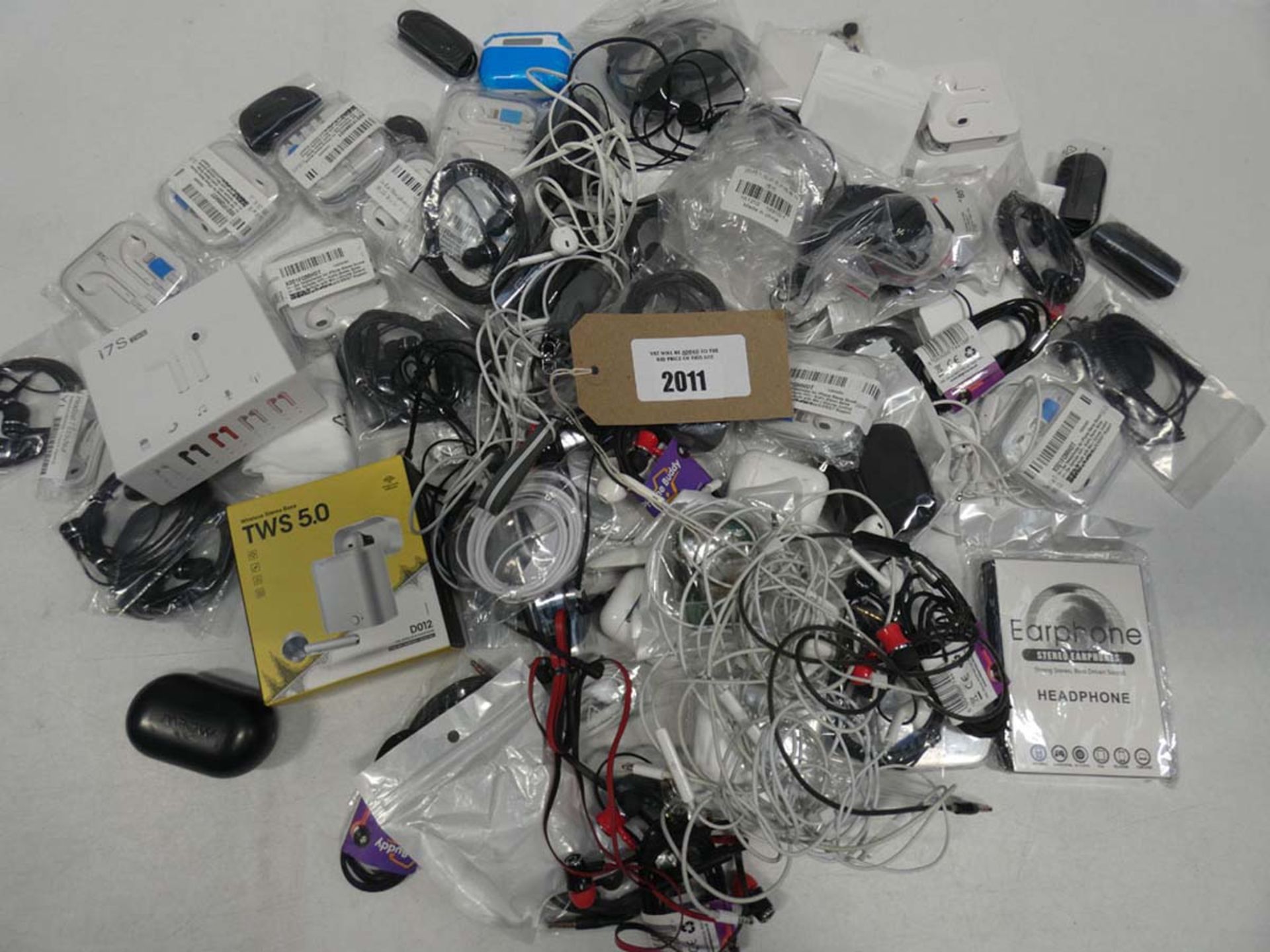 Bag containing quantity of wired and wireless earphones