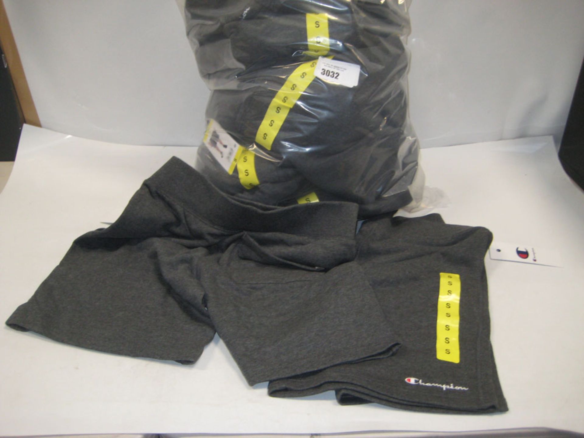 Bag containing approx. 19 pairs of gents grey shorts by Champion, mainly size small