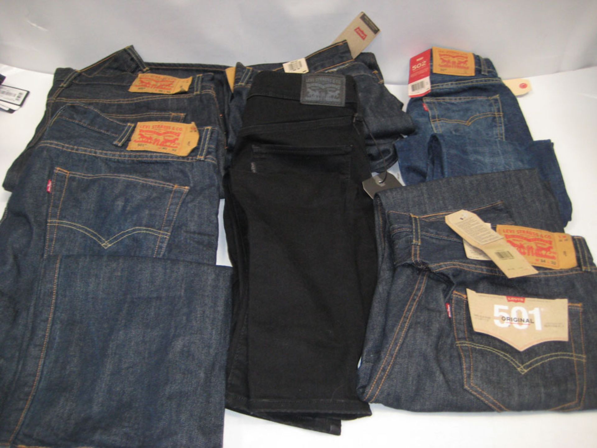 6 pairs of tagged Levi jeans, various styles and colours