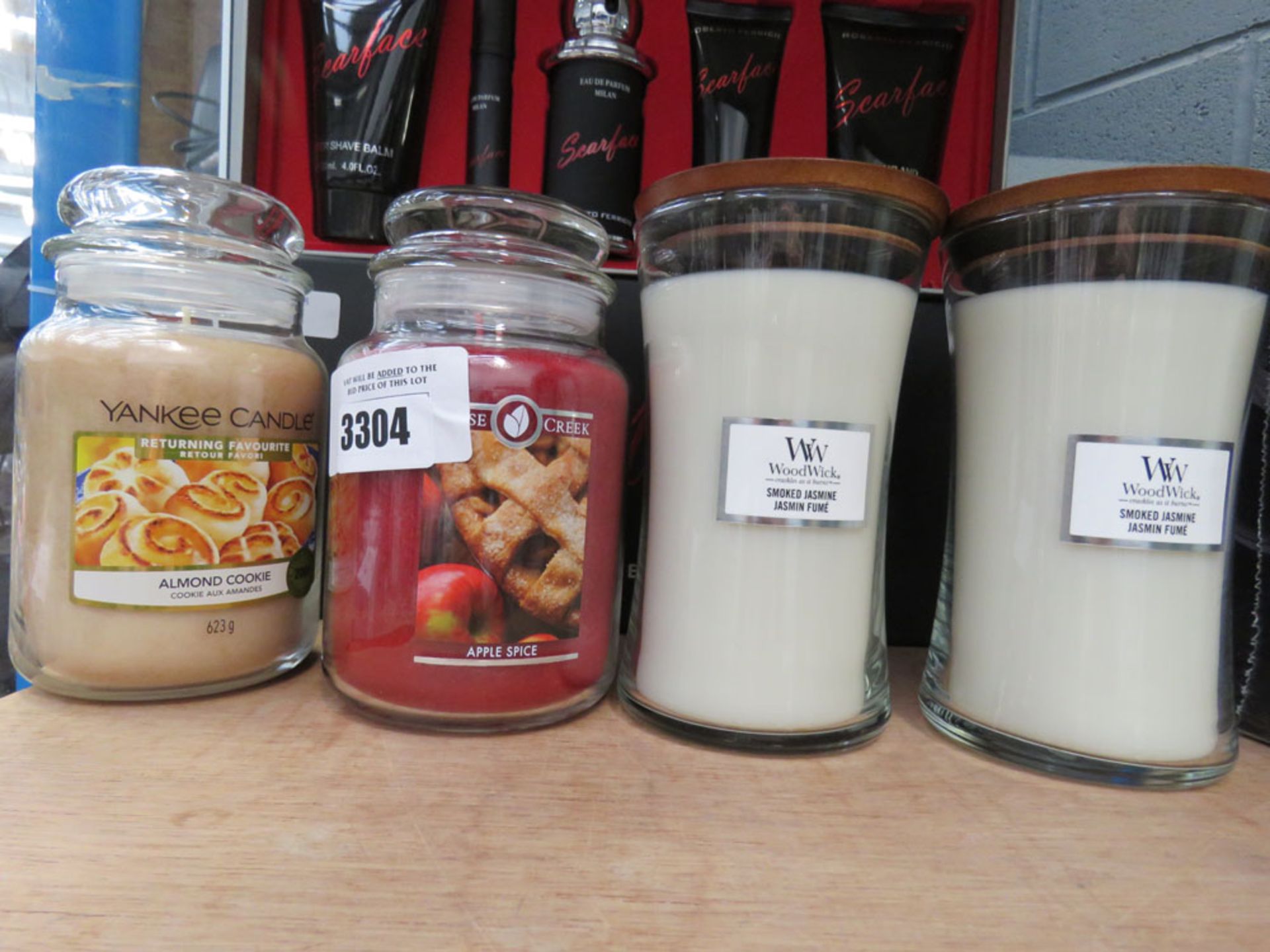 Goose Creek candle plus a Yankee candle and 2 Woodwick candles