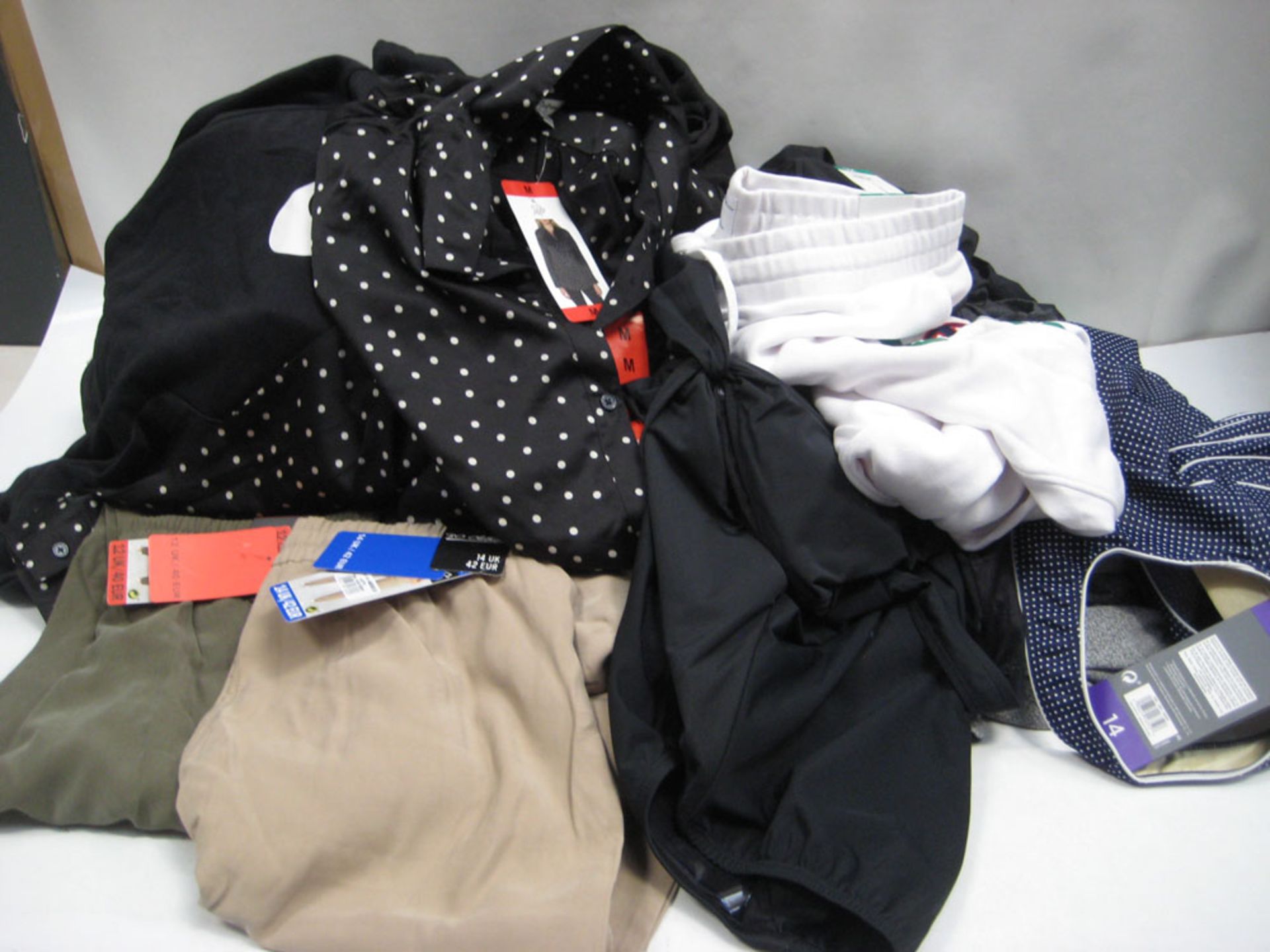 Bag containing ladies clothing to include trousers, jogging bottoms, swim suits, blouses, hoodies,