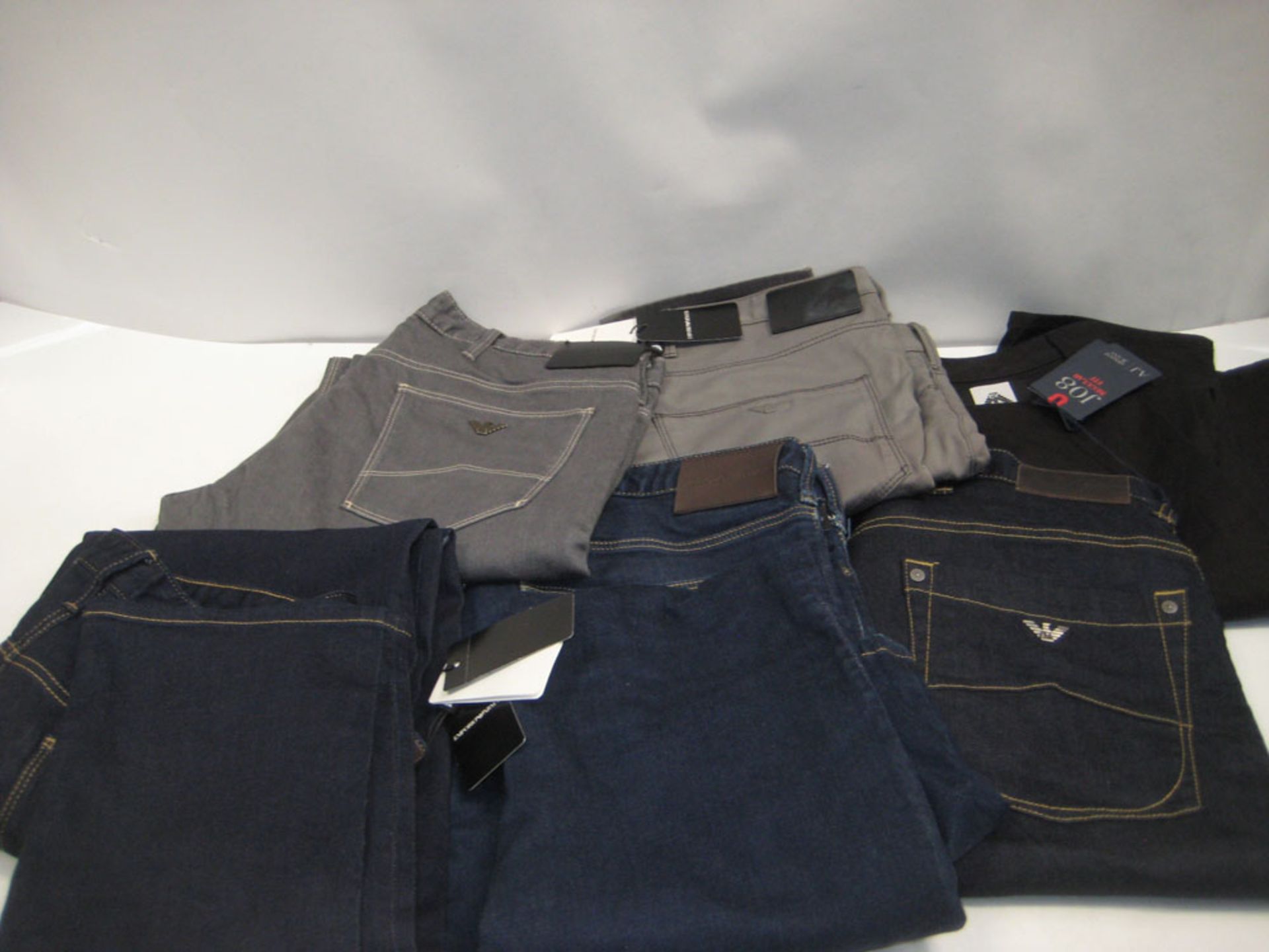 4 pairs of Armani jeans in grey and blue, together with 2 pairs of Armani chino's, various sizes,