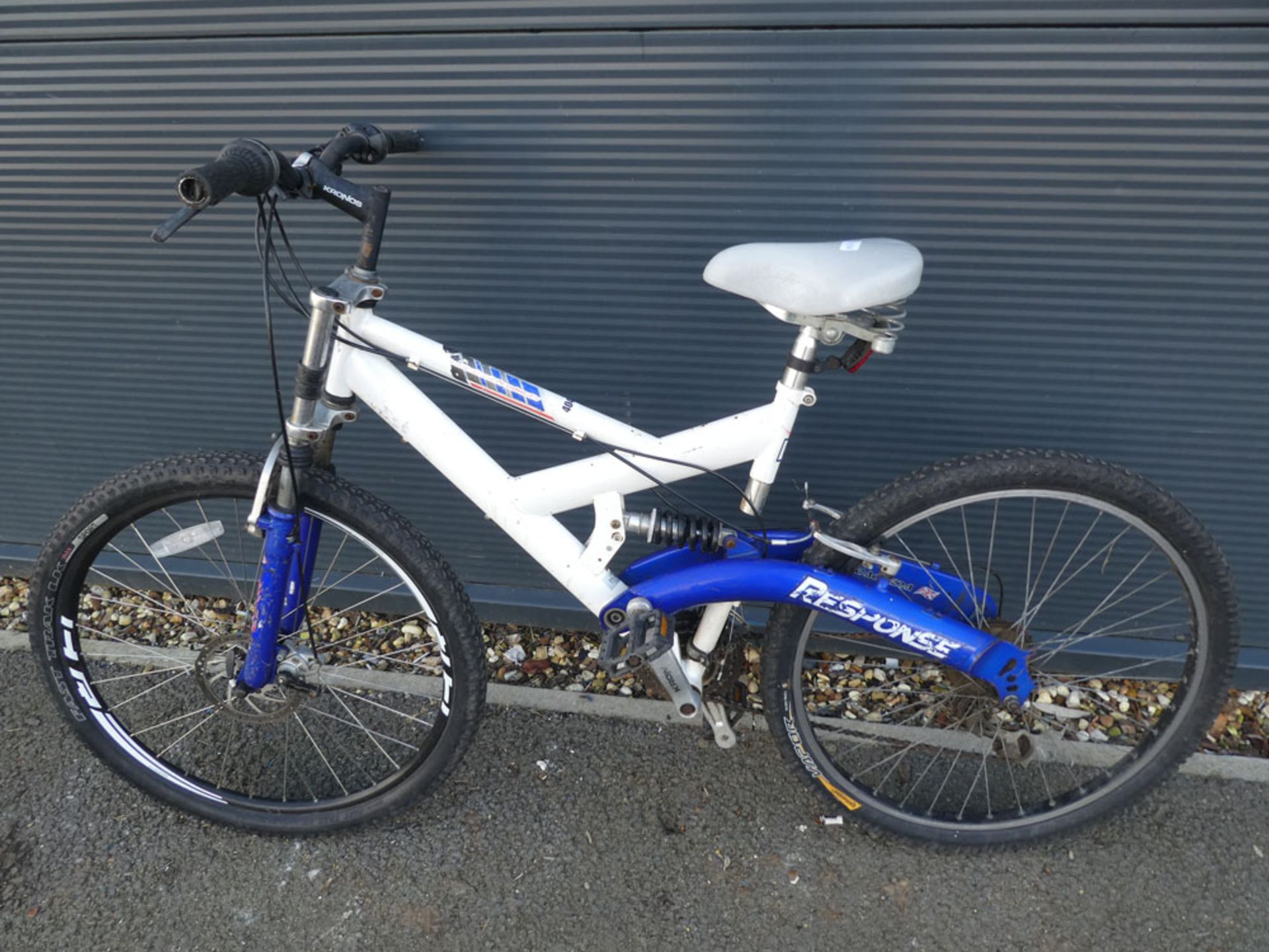 White and blue childs mountain bike