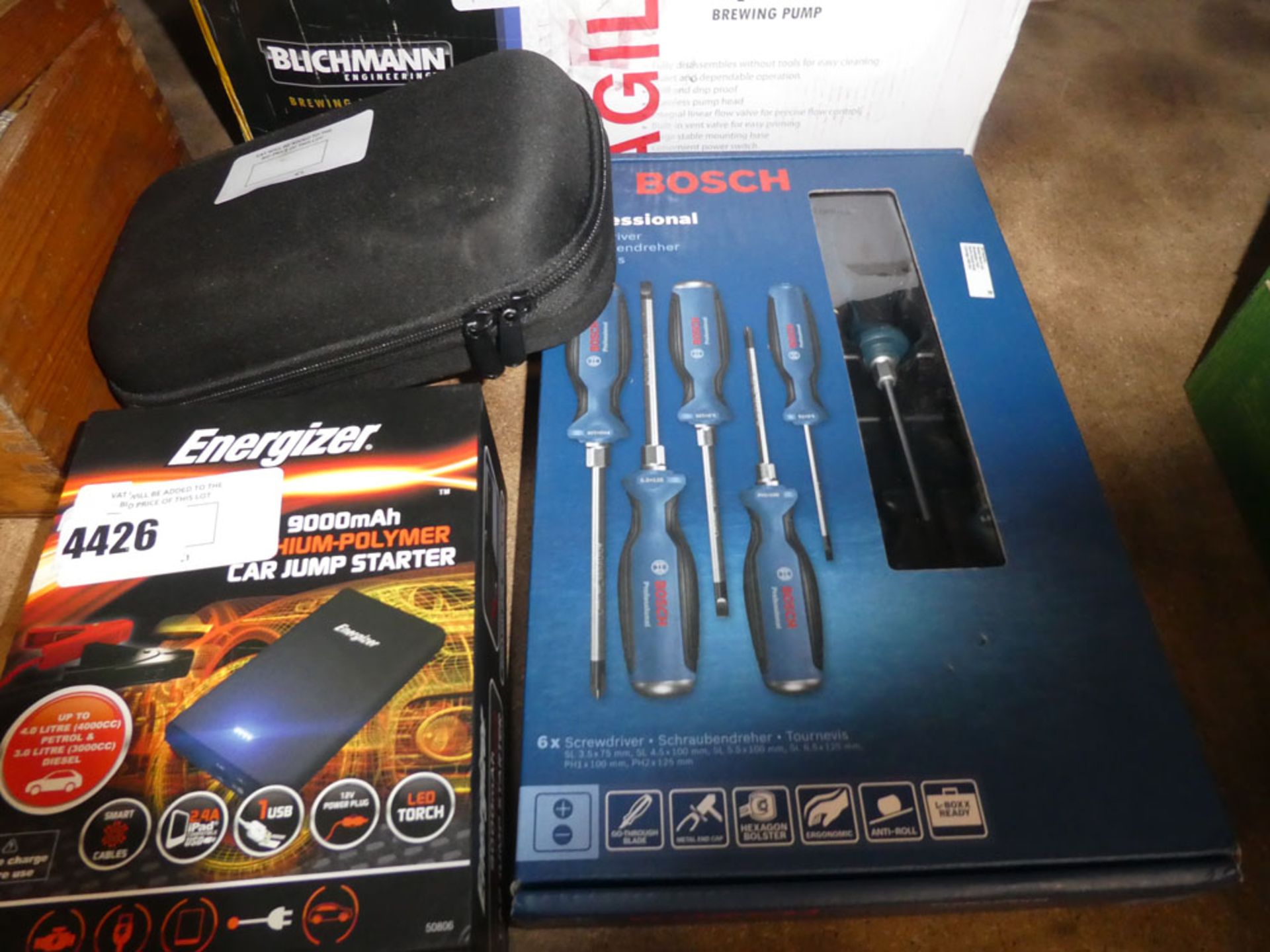 Energiser car jumpstart and box of Bosch screwdrivers, and powerbank