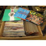 Box containing 7'' vinyl records