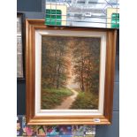 Etore Marinelli framed and glazed oil on canvas of a woodside walk