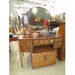 Mahogany dressing table on tapered supports with oval mirror