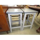 2 grey painted barstools