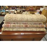 2 carpet runners with beige and floral finish