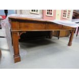 Low darkwood coffee table with brown leather insert