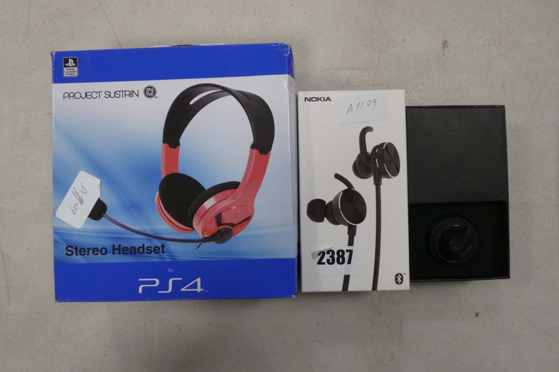 Various headsets to include a Nokia bluetooth headset