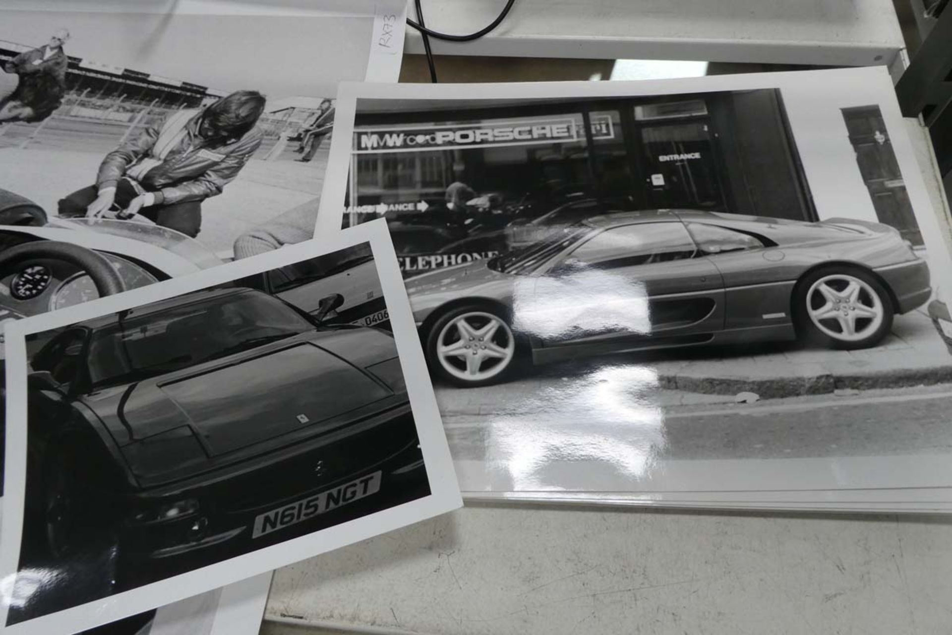 Selection of black and white car and other racing memorabilia photographs to include a large print - Image 2 of 3