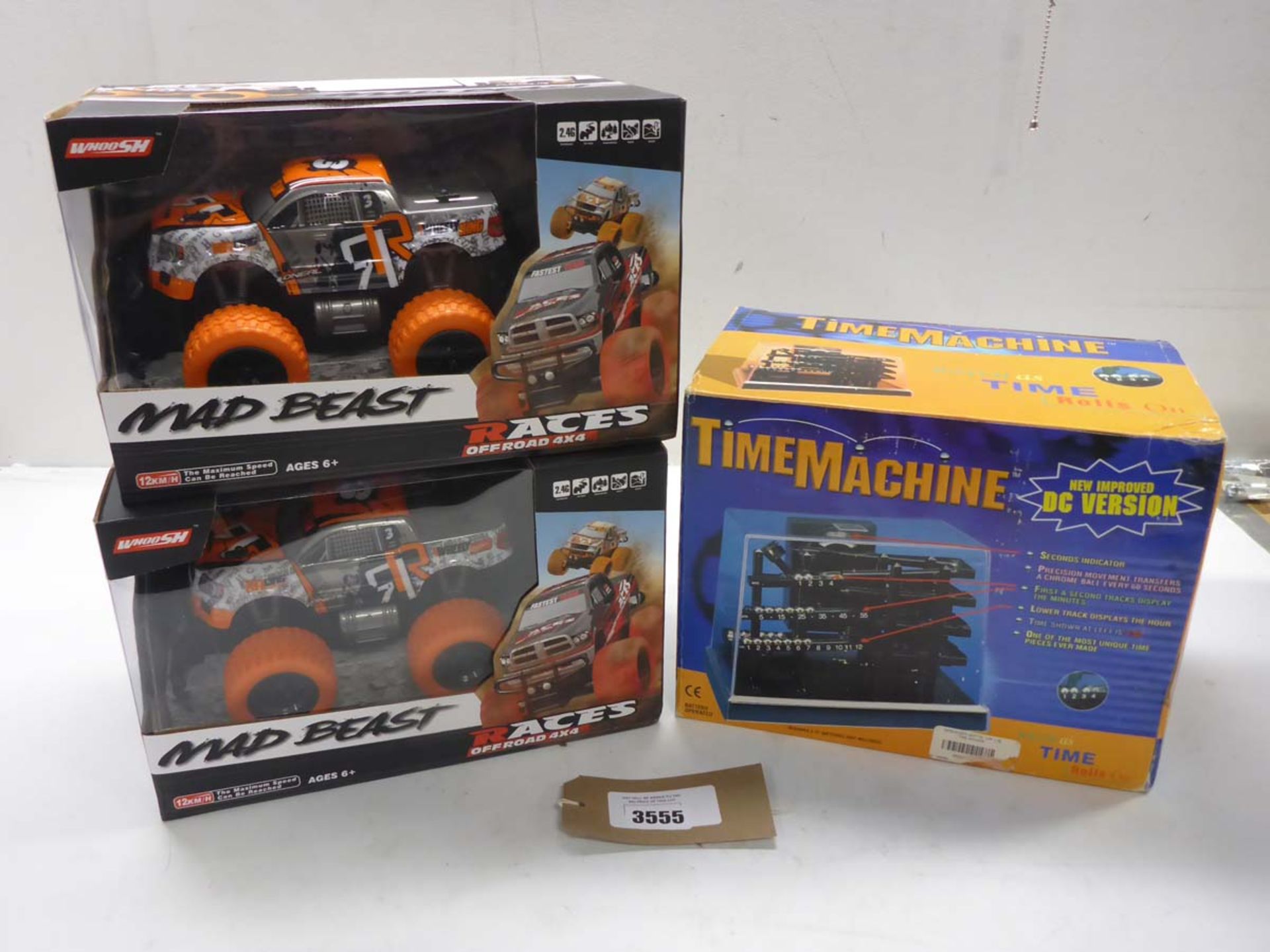 2 x Mad Beast Off Road 4 x 4 r/c trucks and Time Machine