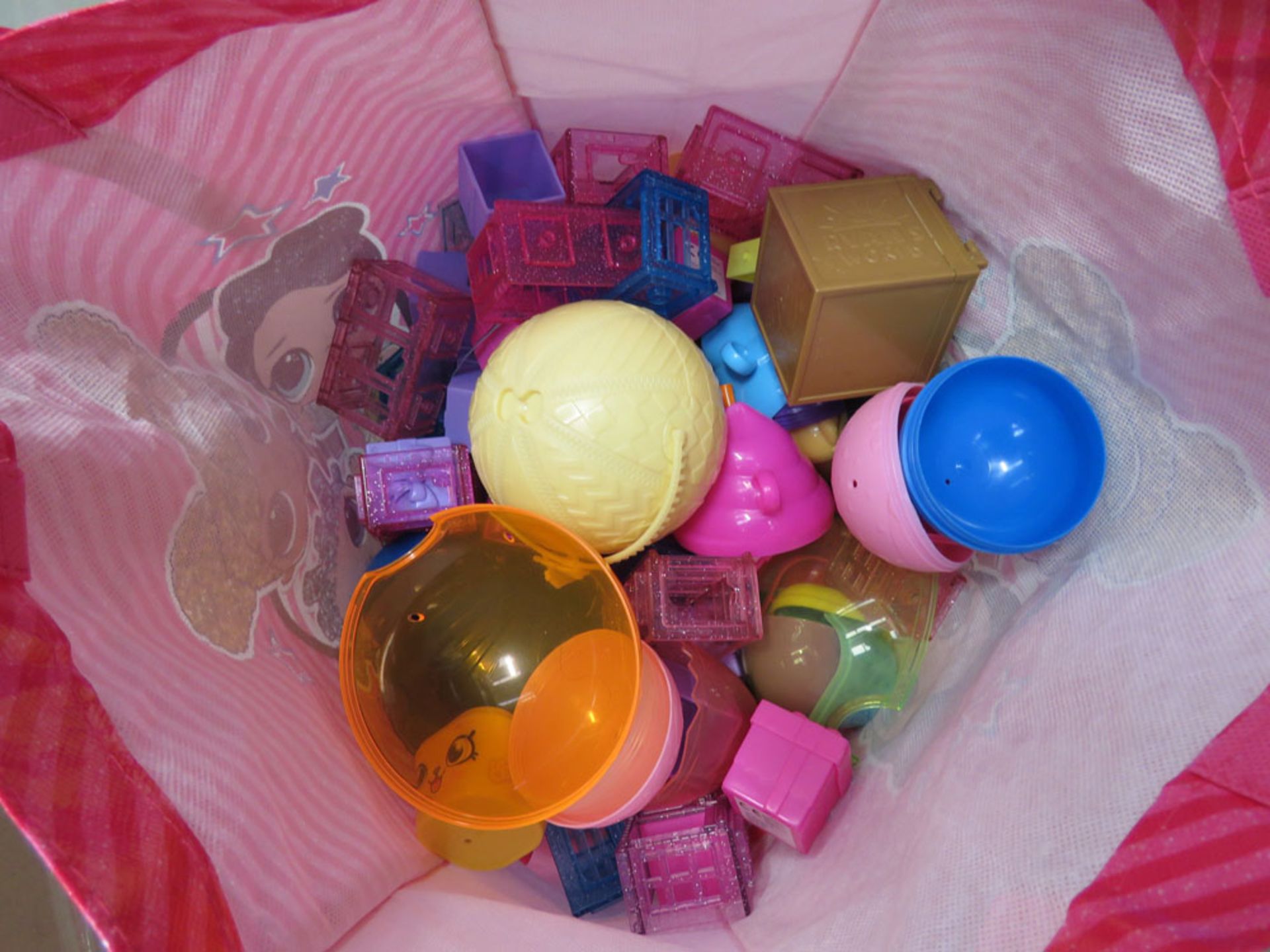 Bag containing loose kids toys