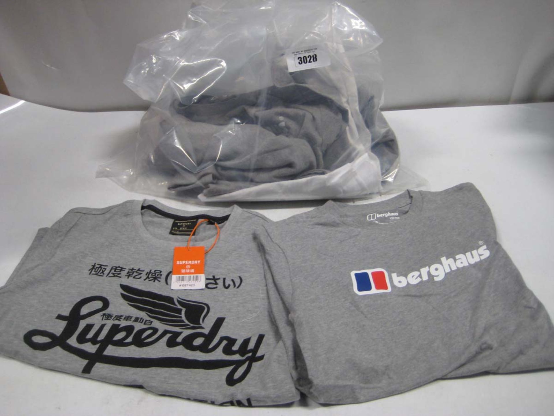 Bag containing approx. 10 Berghaus and Superdry t-shirts in grey and white