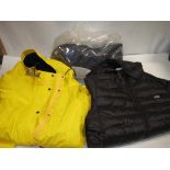 Bag of containing various coats and gilets