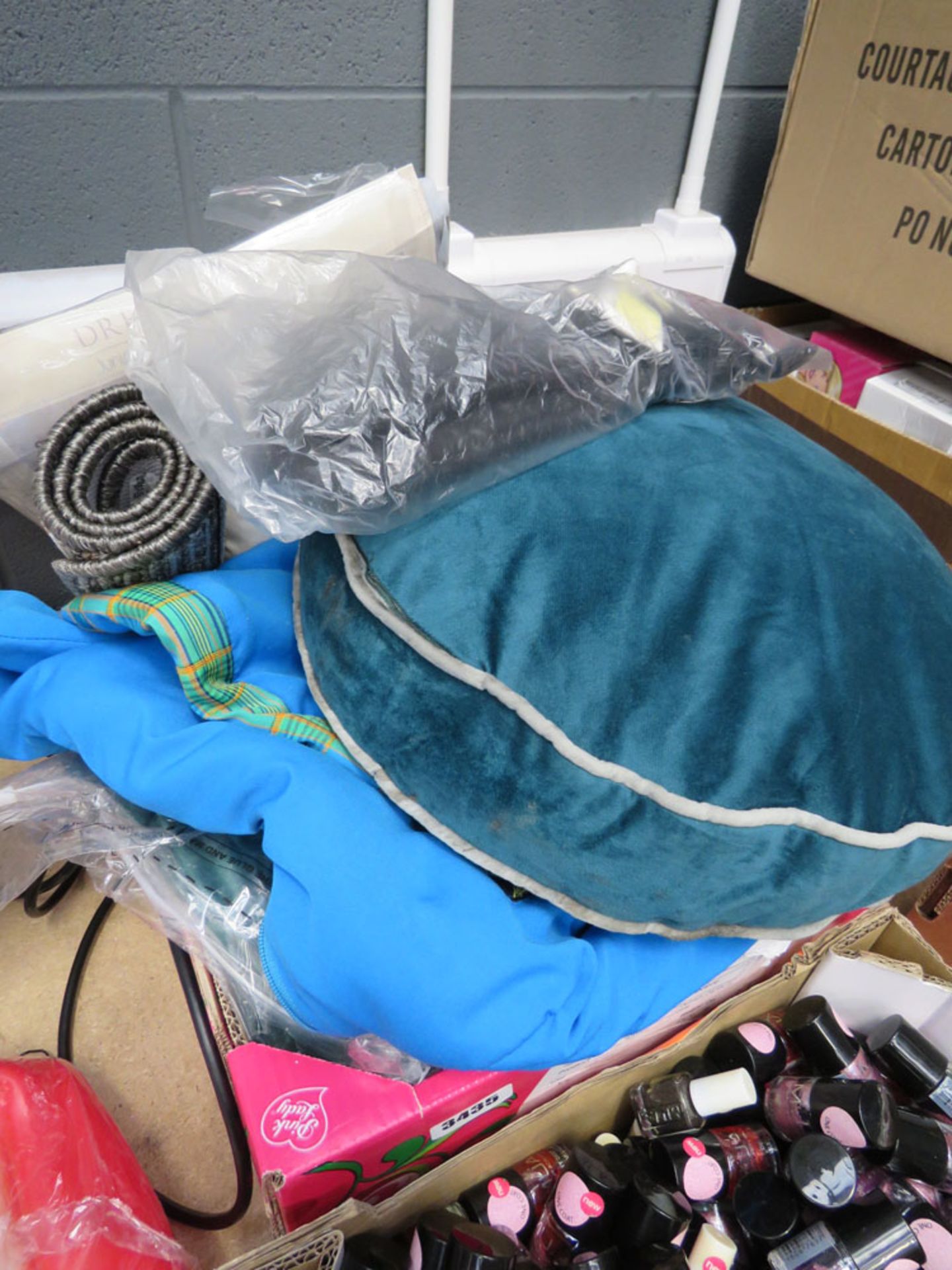 Tray containing pillows, mat etc.