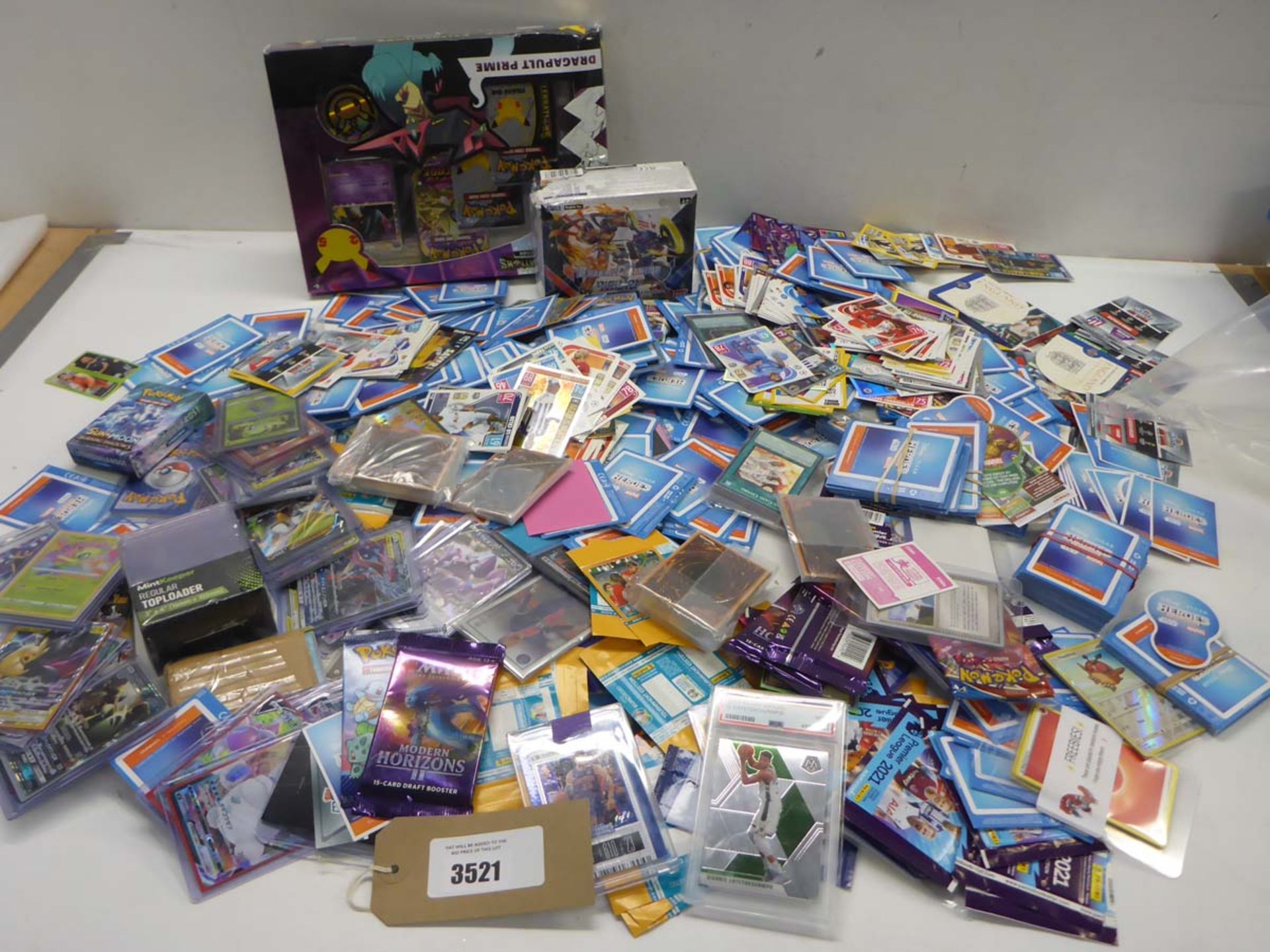 Large selection of collectable trading cards including Basketball, Pokemon, Match Attax, Magic The