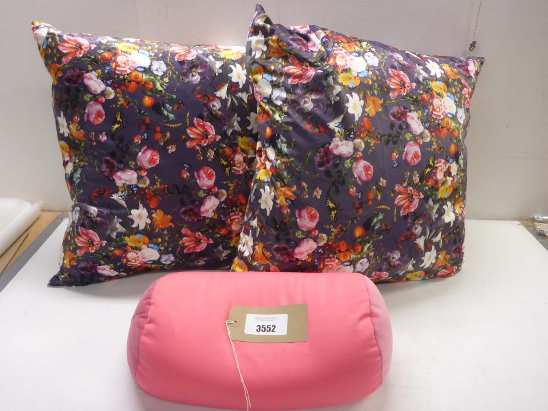 2 large floral decorated cushion and small pink cushion