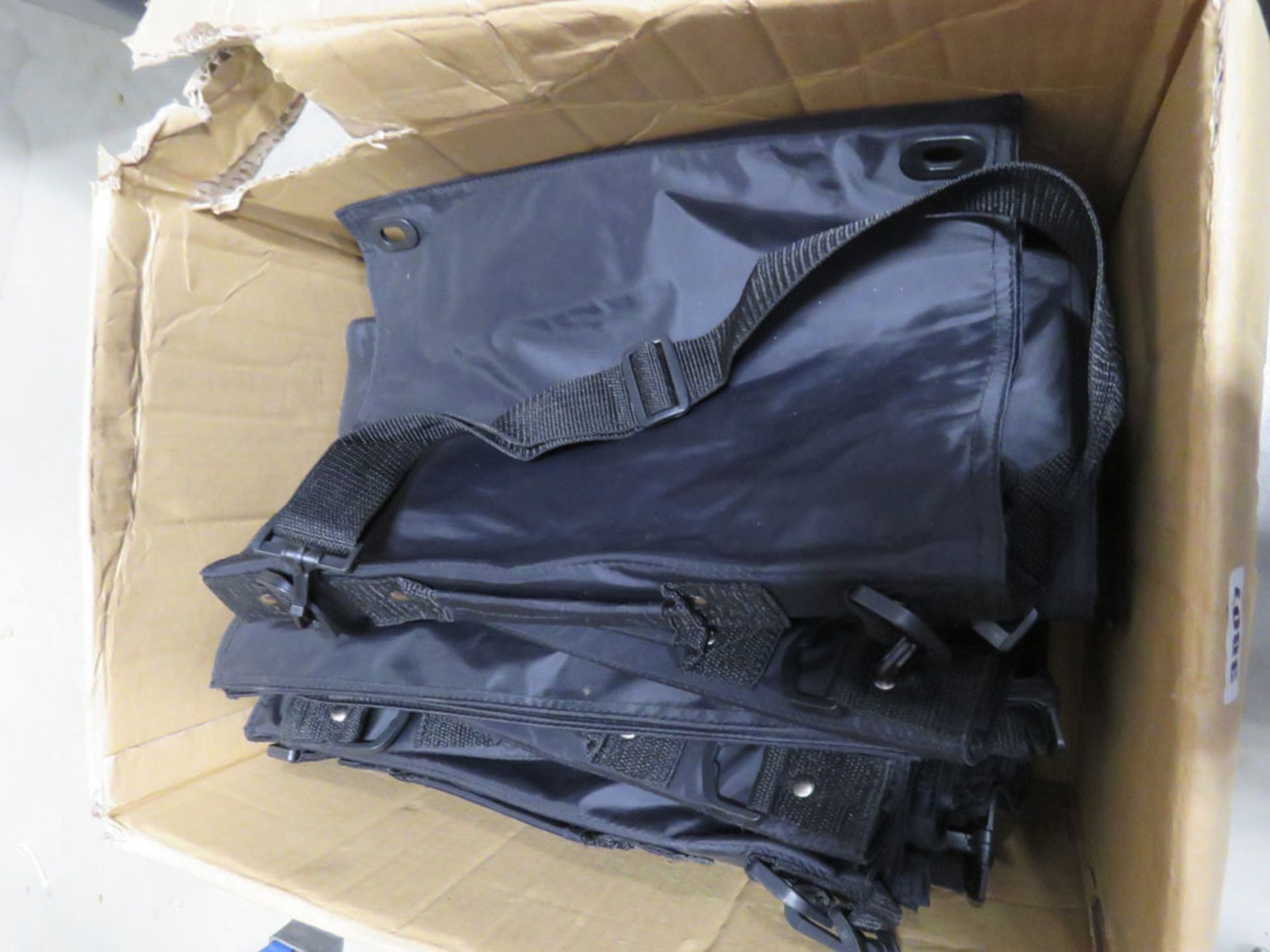 Box of black laptop bags