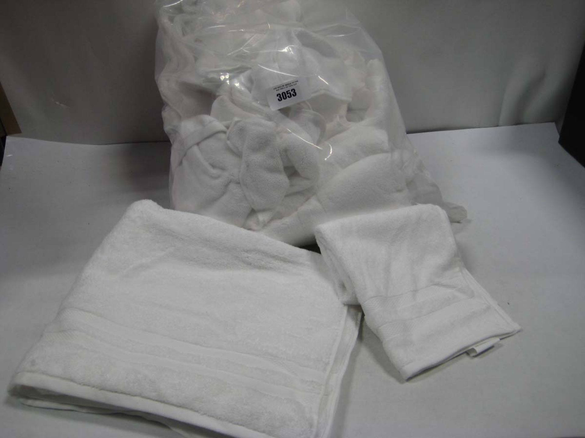Bag containing white towels