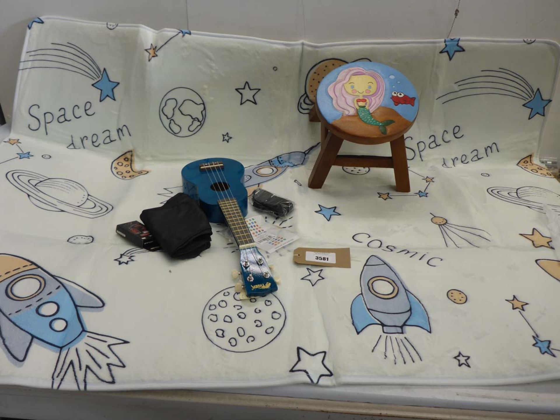 Ukulele, Small child's wooden stool and large space design child's play mat