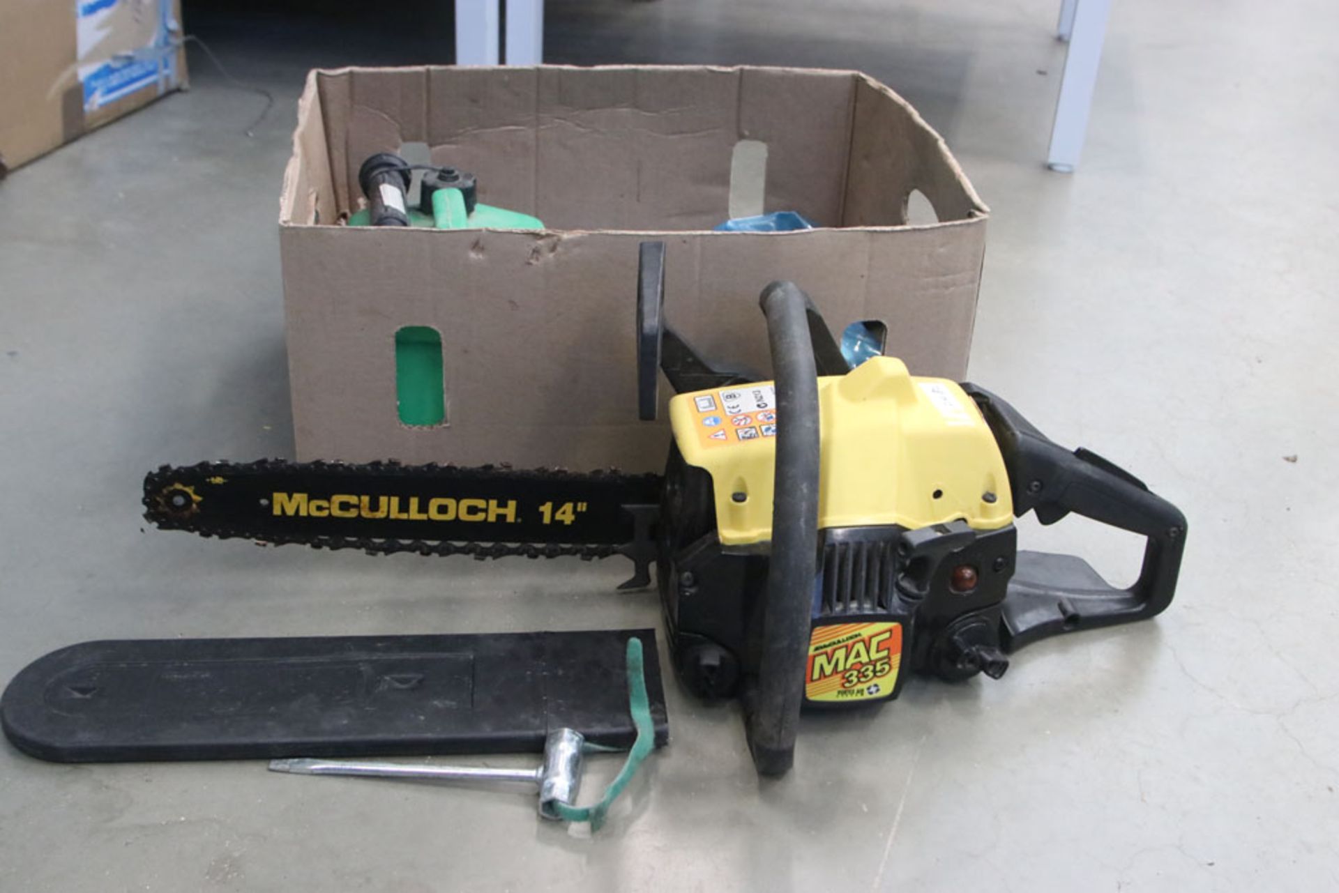 Yellow McCullough chainsaw and cardboard box with fuel can and oils - Image 3 of 3