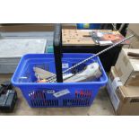 Plastic basket containing various drill bits, gauges, spanners etc