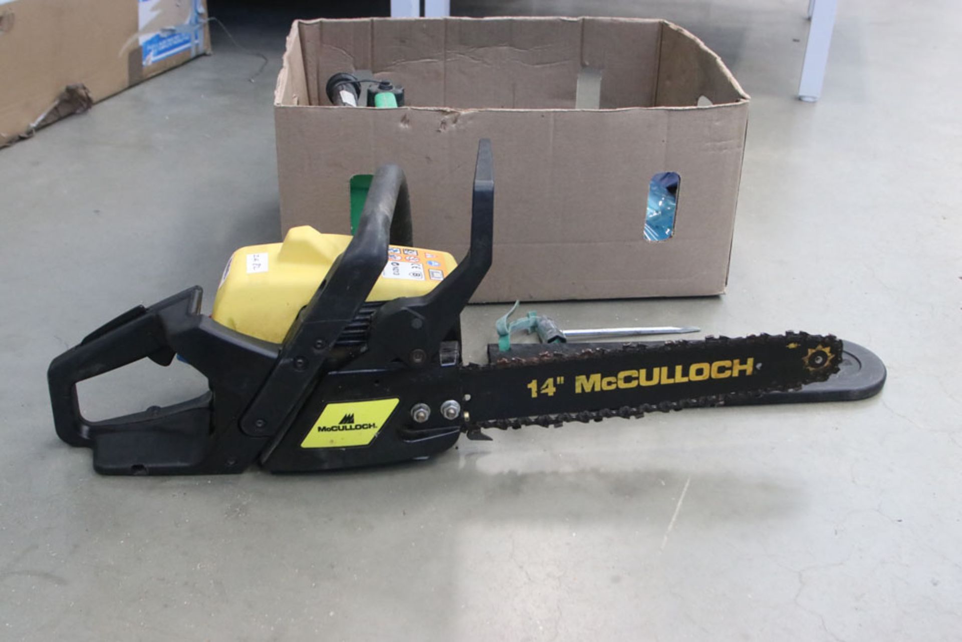 Yellow McCullough chainsaw and cardboard box with fuel can and oils - Image 2 of 3