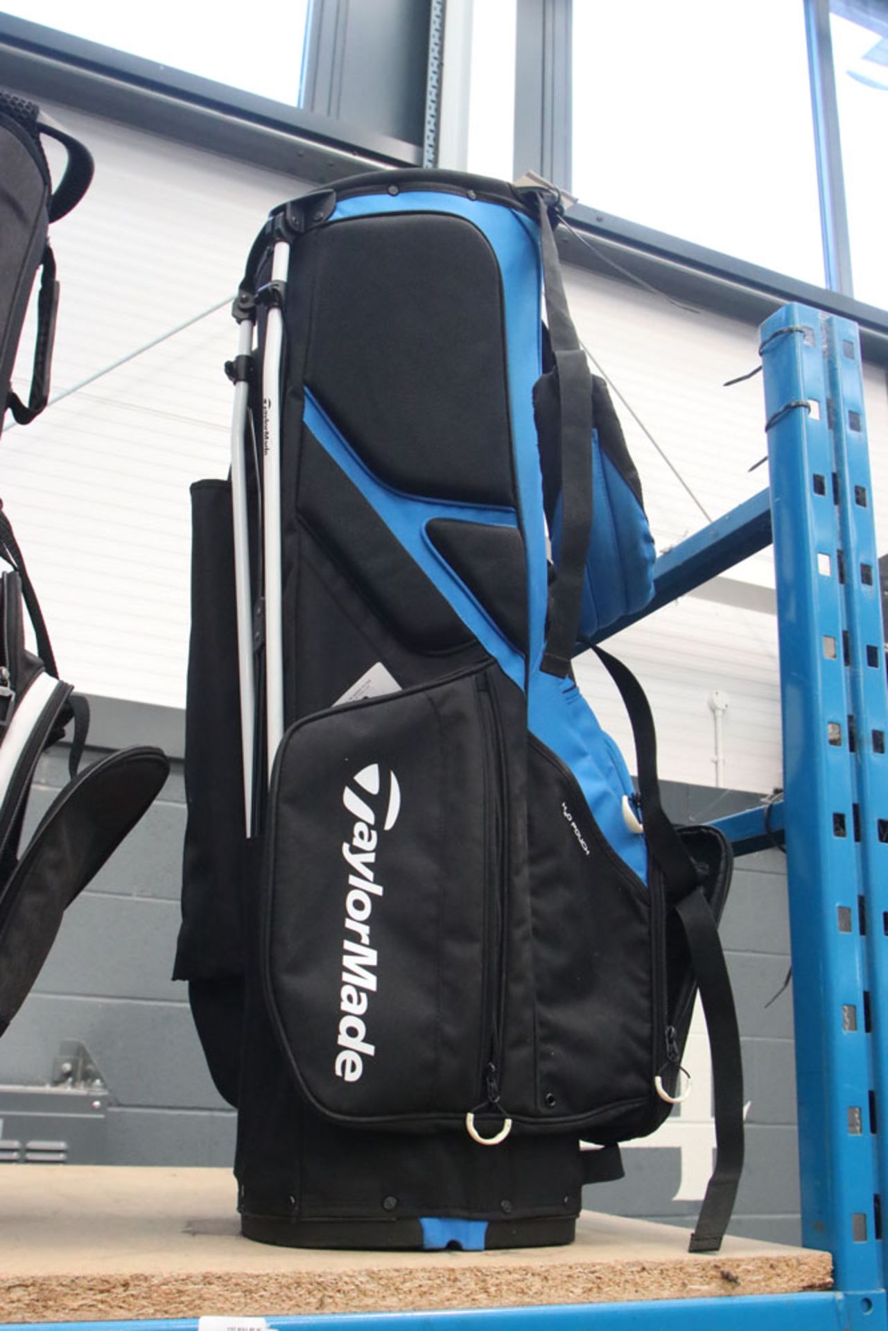 Blue and black Tailor Made golf bag