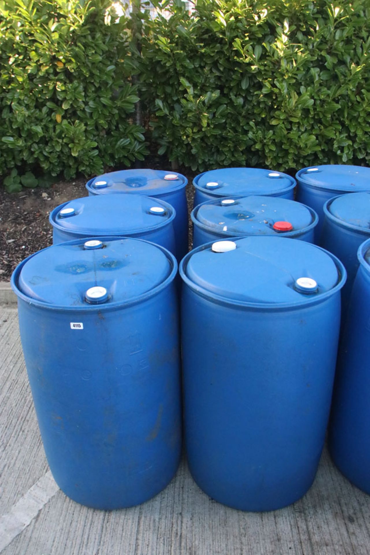 6 blue storage barrels
