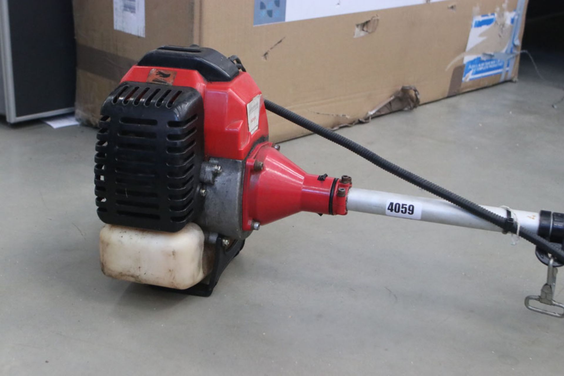 Red petrol powered strimmer - Image 2 of 4
