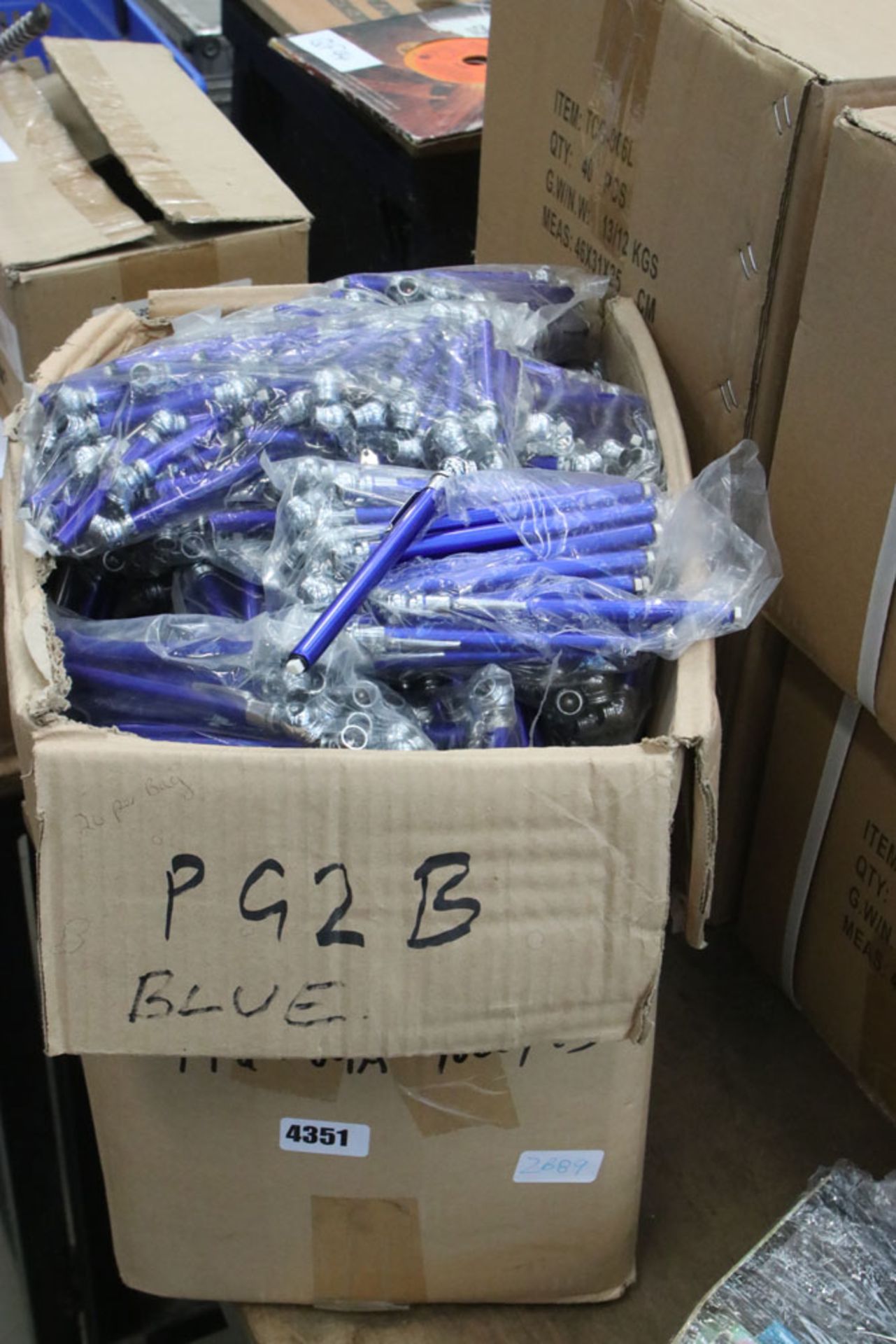 Box of blue tyre gauges