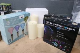 2 boxes of LED colour changing lights and 3 boxes of small string lights, plant self watering