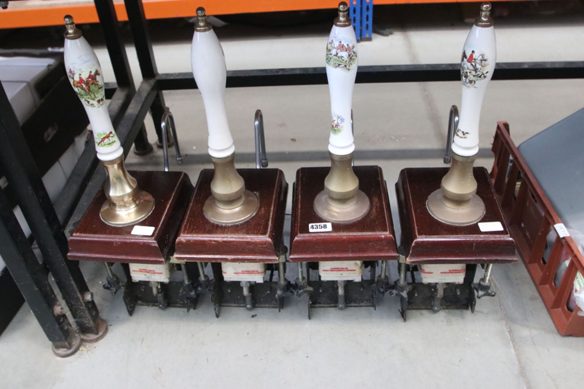 4 beer pumps with hunting scene handles