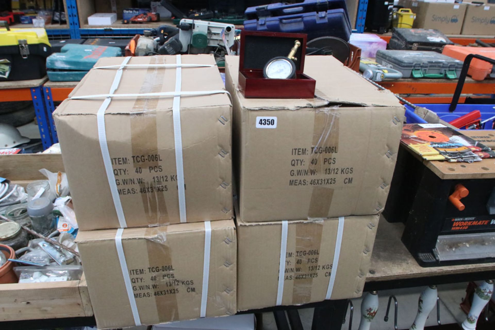 Boxes of brass tyre pressure gauges