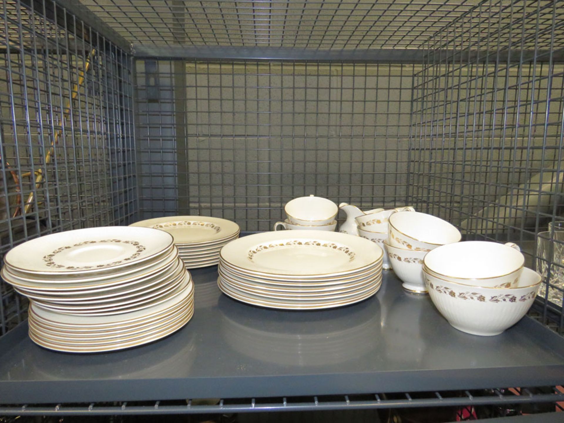 Cage containing a quantity of Royal Doulton Fairfax patterned crockery